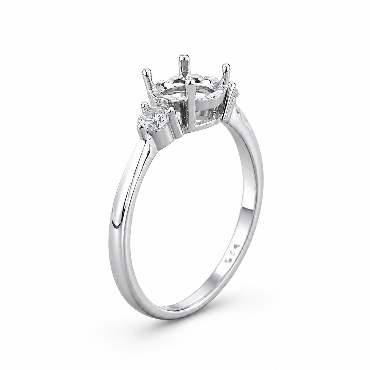 Side view of simple four-prong sterling silver ring setting for round gemstones